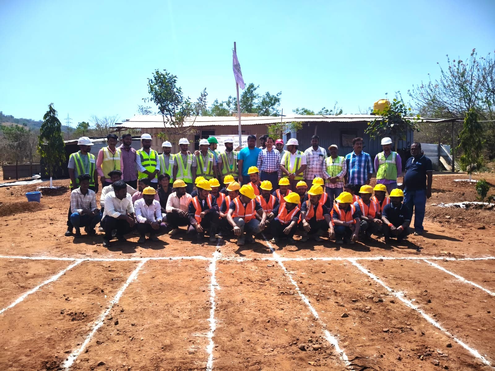 The JNS Infra site team gathered for a group photograph